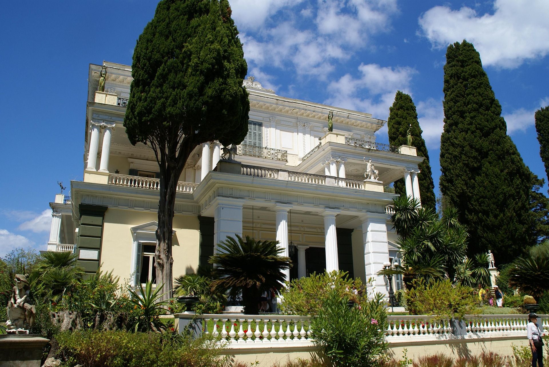 The Achilleion palace among cypress trees and gardens, Corfu
