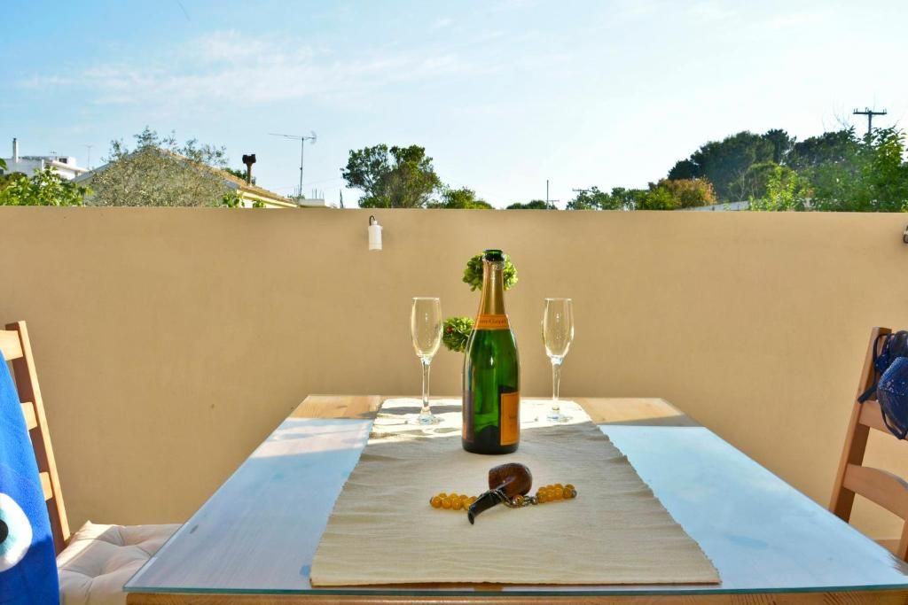 Outdoor table set with sparkling wine on the terrace